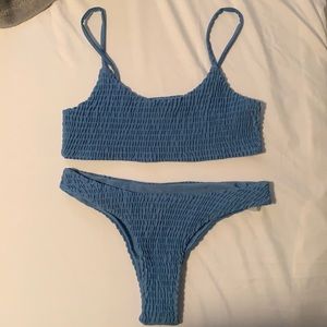 Size small light blue swimsuit